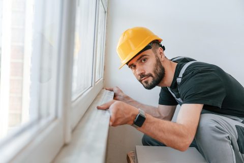 installing a window sill the man is making repair 2023 11 27 05 25 47 utc